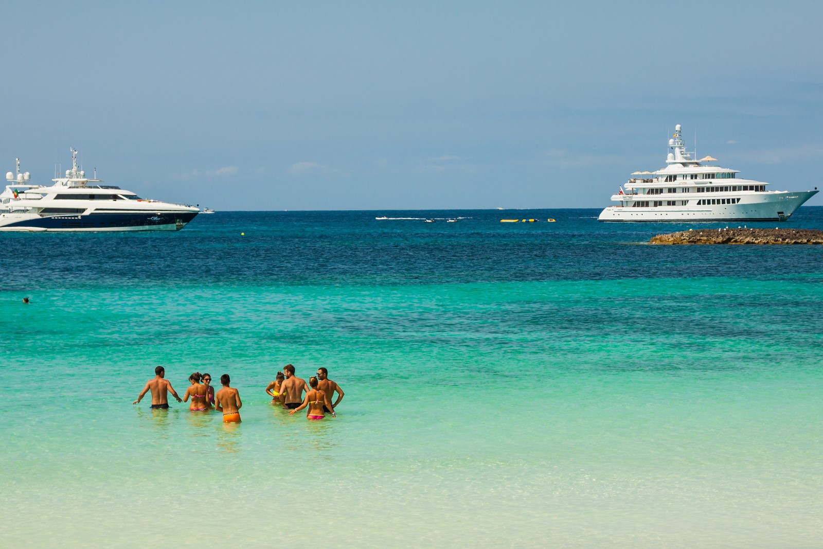 Luxury yachts in turquoise beach of Formentera Illetes,Spain